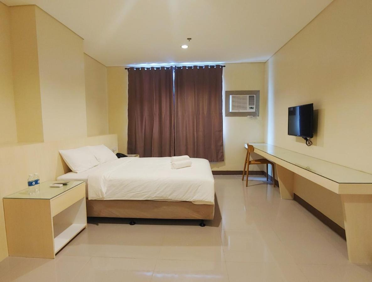 Kaizen Suites Манила Экстерьер фото